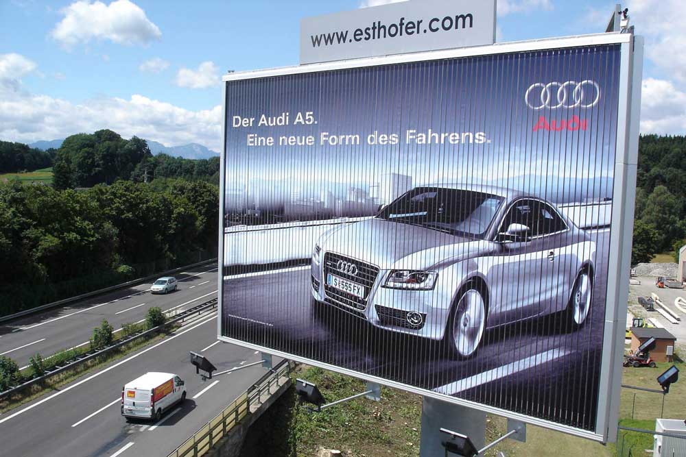 Trivision billboard by Triplesign System with rotating prismatic panels for high-visibility advertising