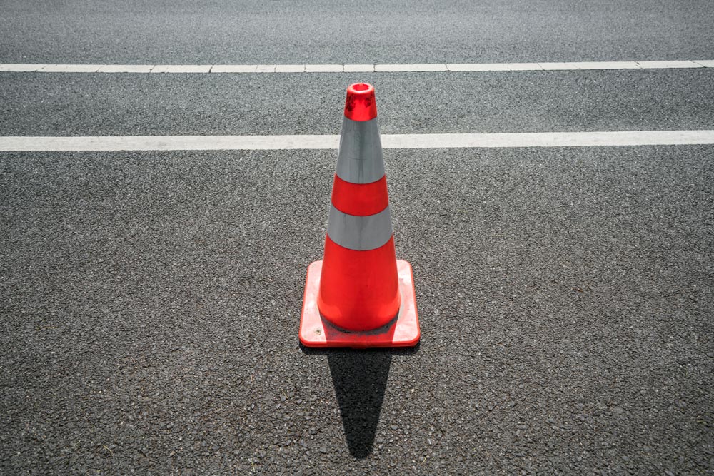 Traffic cone on road