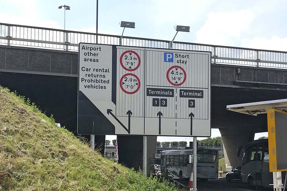 Traffic signage at a airport terminal