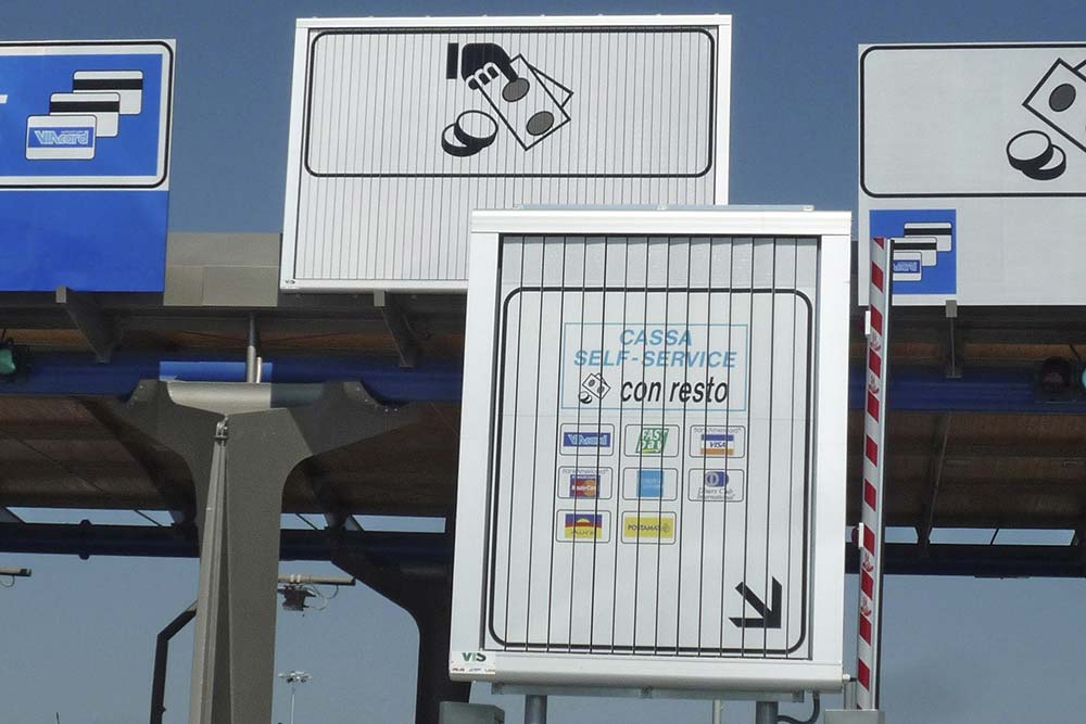 Signage for tolls above a road